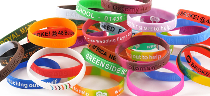 Assortment of coloured and branded silicone wristbands